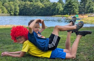 two boys posing in costumes